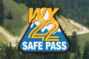 An image of the highway over Teton Pass, with a logo superimposed over it that reads, "WY 22 Safe Pass."