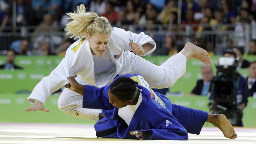 Kayla Harrison of the United States (in white) defeated France's Audrey Tcheumeo in the women's 78 kg judo gold medal match on Thursday in Rio. Harrison, the only American to win a gold in judo, successfully defended the title she won in London four years ago.