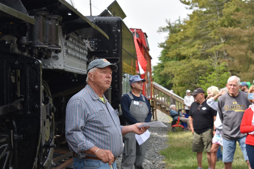 Board member David Ludlow gives a short informational presentation on the mechanics of the locomotive.