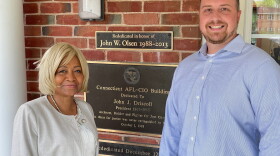 The new faces of labor: Shellye Davis and Ed Hawthorne outside state AFL-CIO headquarters in Rocky Hill. It is dedicated to the two longest-serving presidents, John J. Driscoll and John W. Olsen.