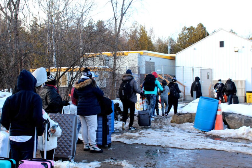 Asylum seekers cross into Canada at Roxham Road, which dead ends at the border in Champlain, N.Y.