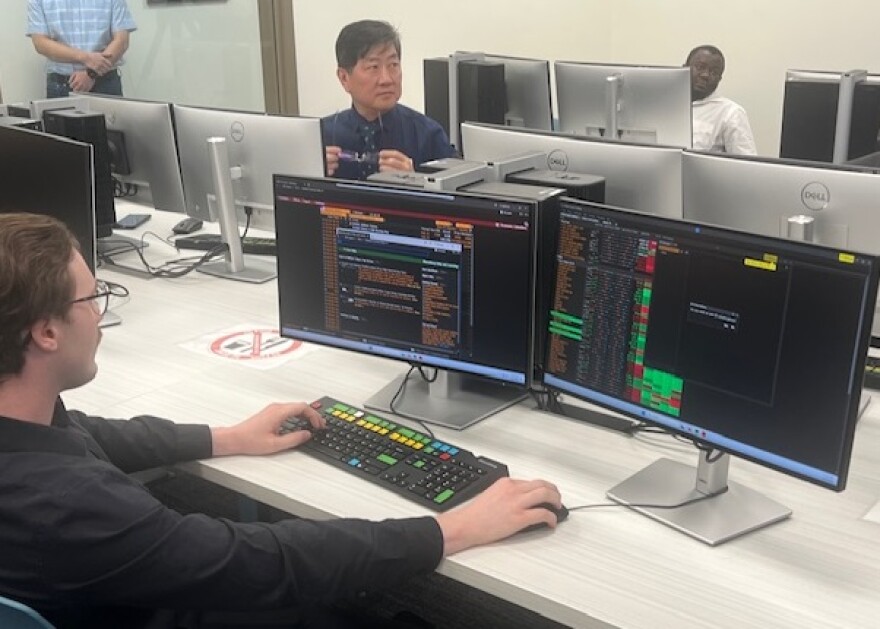 Student Chase Hickey works at a Bloomberg Terminal at the UIS College of Business and Management.
