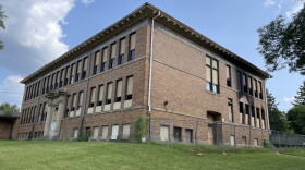 The Genesee Street School's condition has worsened over the years, and most of the building's windows are broken or boarded up. 