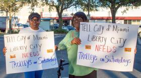 Mary Washington (left) and Annie McGregor (right) rallying for Saturday service at one of the trolley bus stops.