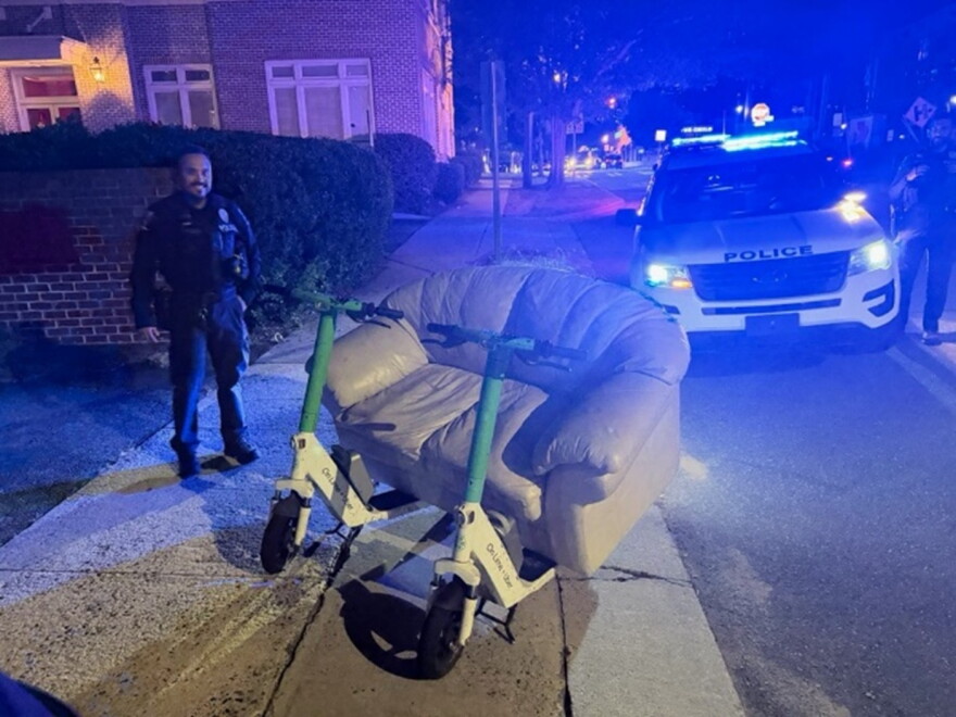 Charlotte-Mecklenburg police pulled over two men riding a sofa balanced across two scooters this weekend.