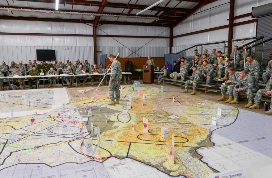 Service members at a 2015 war-fighter exercise participate in a combined arms rehearsal at Camp Atterbury and Muscatatuck. The Indiana National Guard is hoping its base will continue to serve organizations that need training facilities.