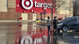 People shop at a Target store in Clifton, New Jersey, on Monday, December 18, 2023. (AP Photo/Ted Shaffrey)