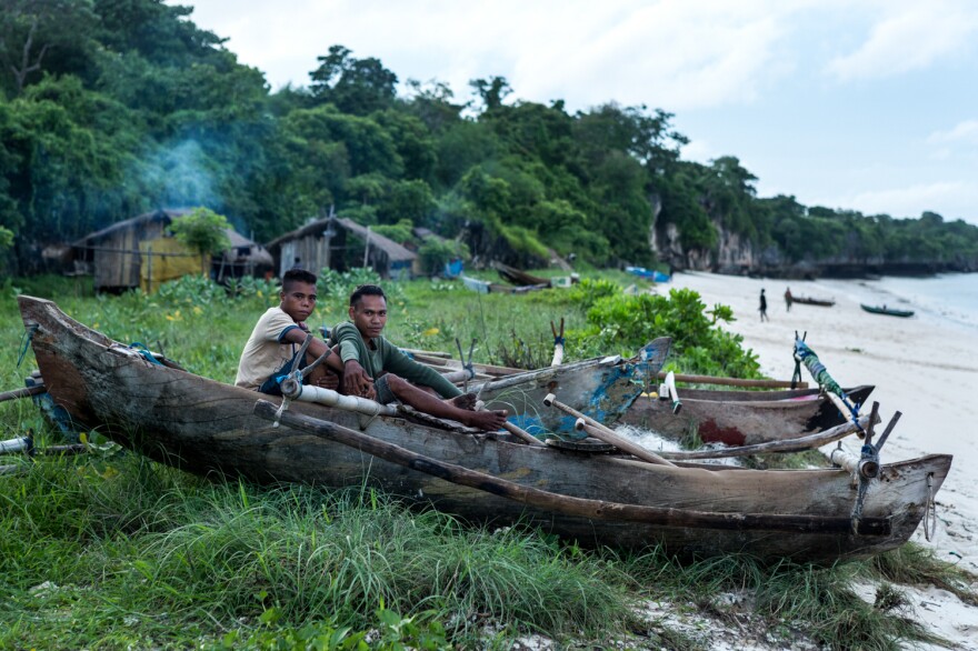 It's a challenge to bring health care to all the residents of rural Sumba Island. Above: subsistence fishermen who live in caves.