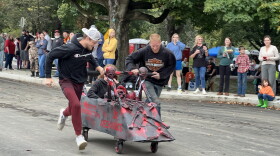 A team sprints down the track at the annual Chillicothe Coffin Races.