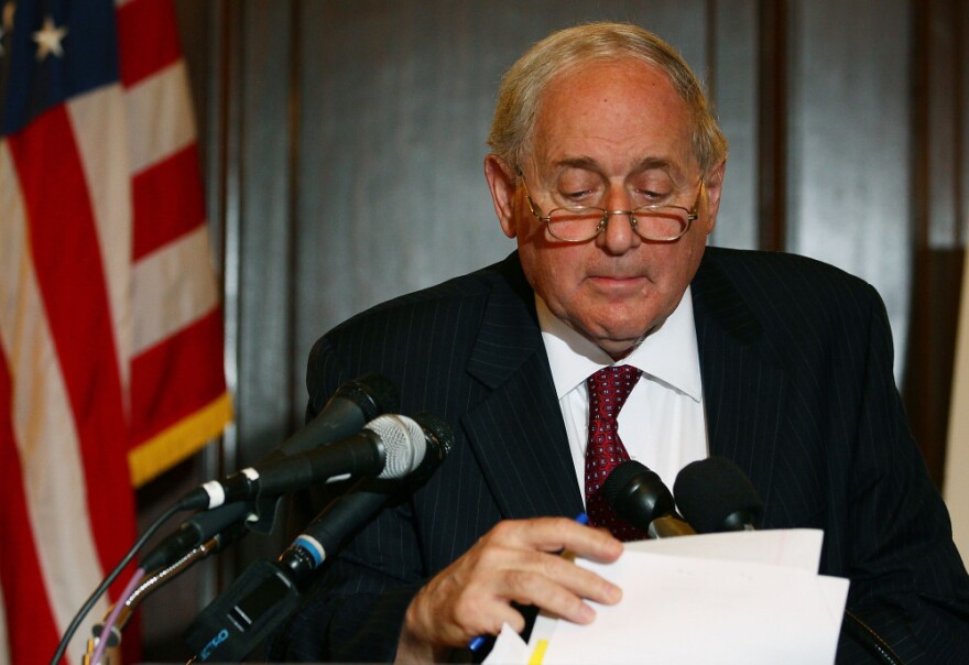 <p>Senate Armed Services Chairman Carl Levin (D-MI), looks at his papers while talking about U.S. companies recieving large tax breaks, during a news conference on Capitol Hill.</p>