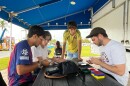 A group of young men gather at Haulover Park in Miami Beach to trade Panini stickers in May 2026 ahead of the World Cup.