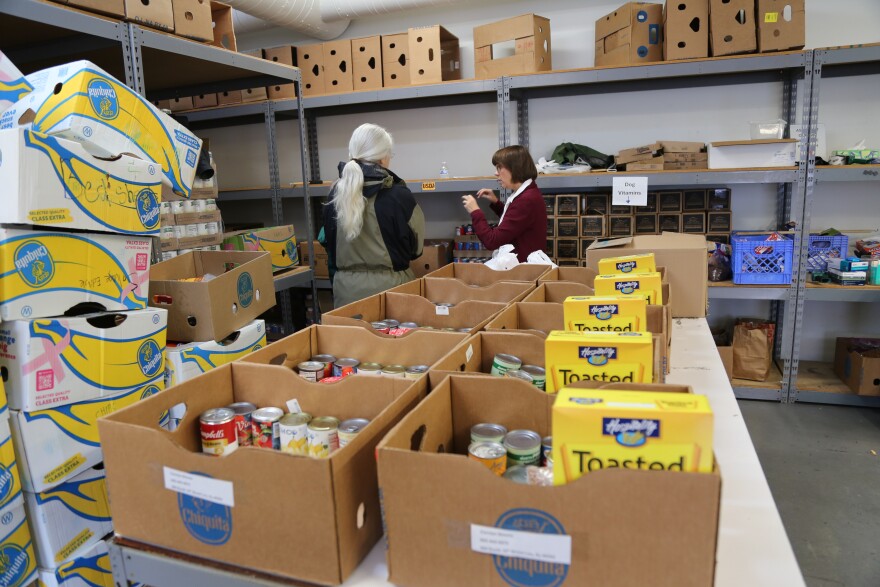 Volunteers at the Sister Visitor Center stock the food pantry in west Louisville ahead of opening on Thursday, Oct. 30, 2025.