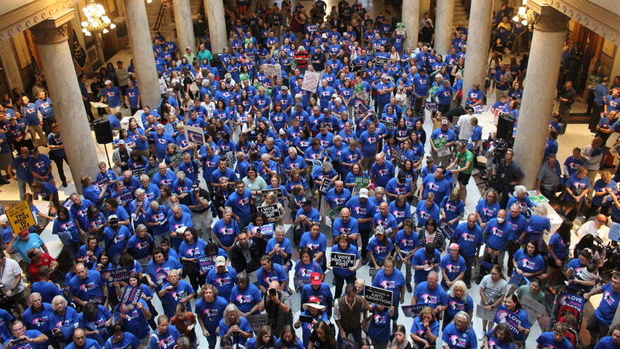 Hundreds gathered at that Statehouse for the “Love Them Both” anti-abortion rally organized by Indiana Right to Life. The group urged lawmakers to restrict abortion and increase support for pregnant Hoosiers and children. Emilie Syberg / WFYI
