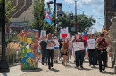 Demonstrators rally in downtown Dayton, calling for an end to anti-trans legislation in the Ohio Statehouse.