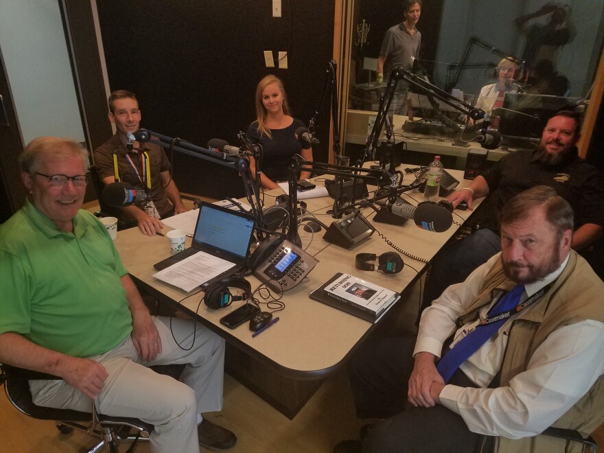 WFPL Health Reporter Lisa Gillespie (center top), VA Medical Center Suicide Prevention Coordinator Kelly Marcum (center left), In Conversation Host Rick Howlett (left), Kentucky Department of Veterans Affairs Legal Counsel Dennis Shepherd (bottom right), Veterans Club Founder Jeremy Harrell (top right)