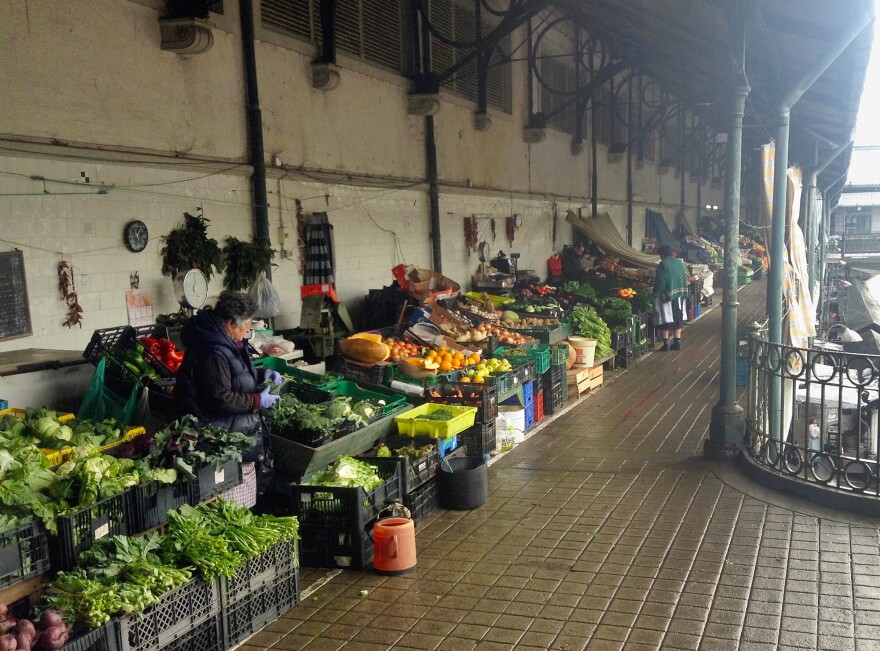 Stalls inside Porto's 19th-century Bolhão Market, where Worst Tours takes visitors to show them economic conditions in the city.