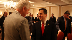 Then-U.S. Rep. Dan Boren talking with former President Bill Clinton during a 2011 meeting of the Blue Dog Coalition of conservative Democrats in New York.