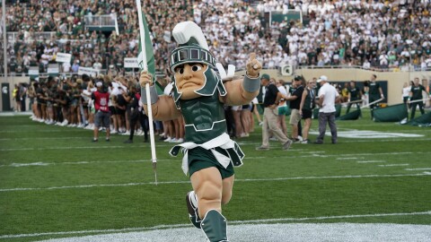 Sparty, the Michigan State mascot, runs onto the field before the first half of an NCAA college football game against Western Michigan, Friday, Sept. 2, 2022, in East Lansing, Mich. (AP Photo/Carlos Osorio)