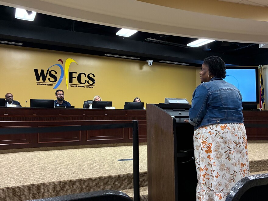 Grace Campbell-Sheran, a library media coordinator, speaks to the school board
