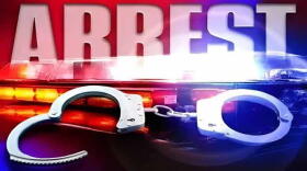 Handcuffs and the word 'arrest'