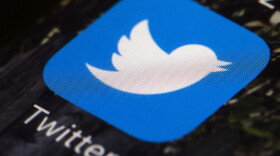 The Twitter app icon on a mobile phone in Philadelphia. (Matt Rourke/AP)