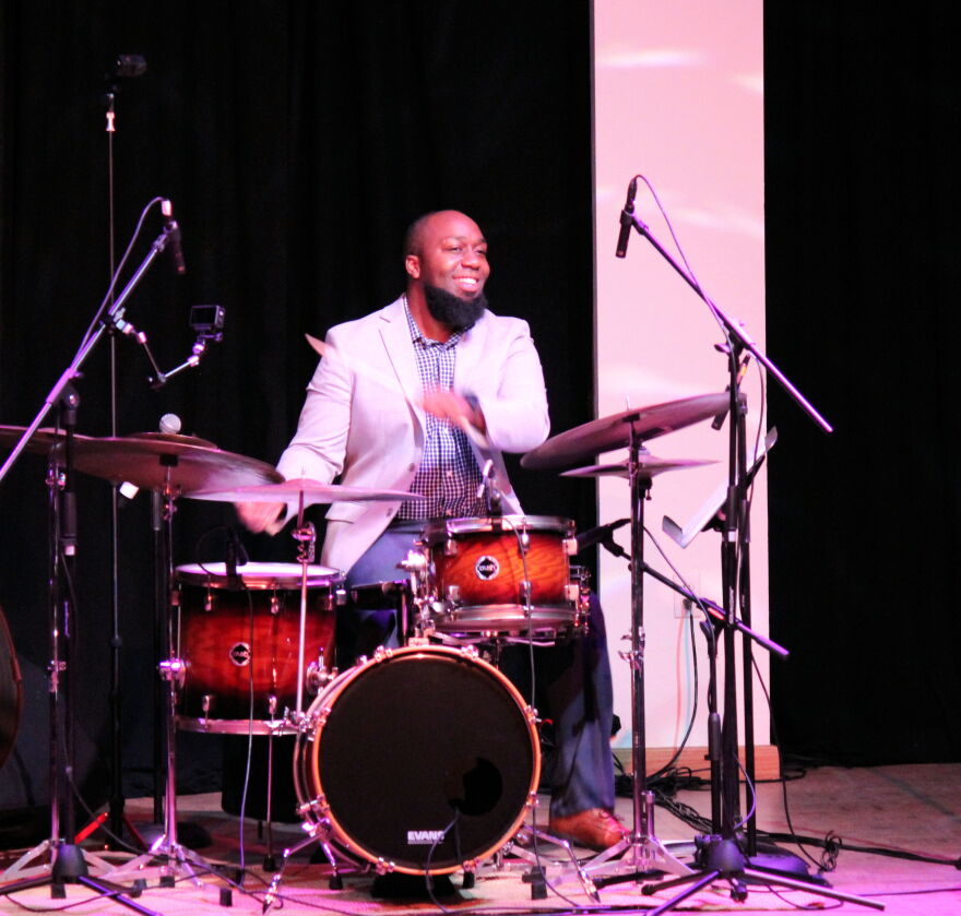 Paul Gavin on drums during Gulf Coast Jazz Collective performance.