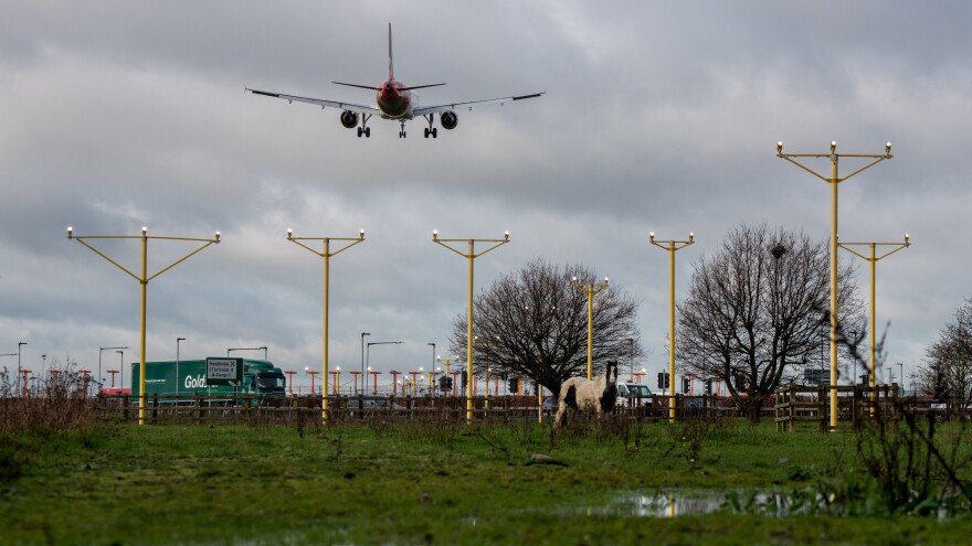 An airplane arrives at London's Heathrow Airport on Thursday — the same day a court blocked plans for a third runway at the airport, citing the government's climate change commitments.
