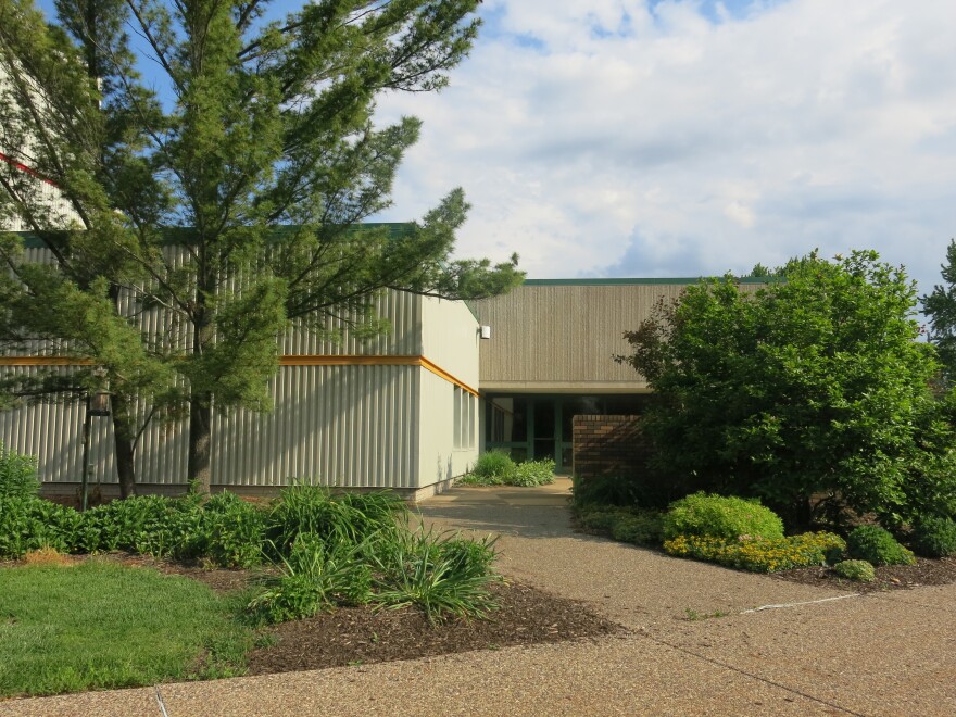 Library patrons should use the rear entrance.