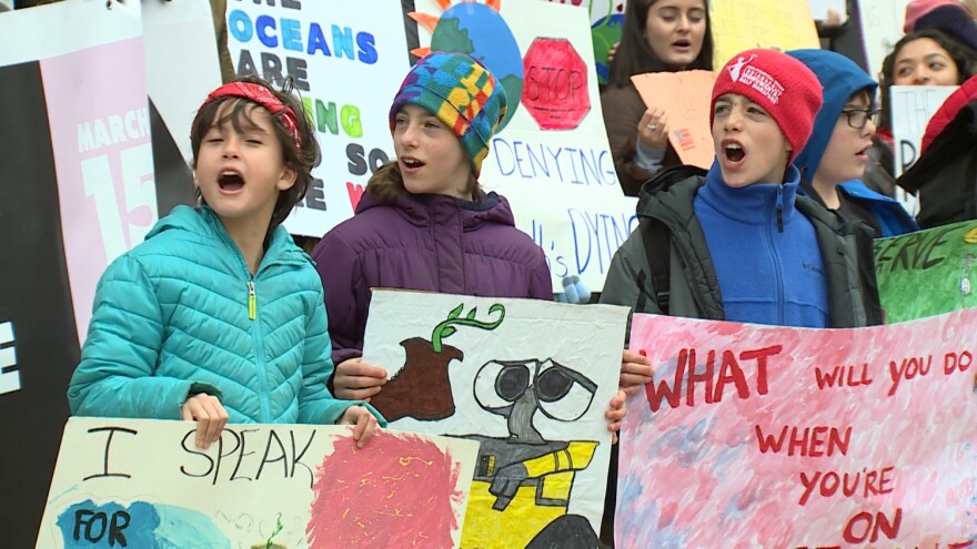 Kids at a youth climate march at the Indiana Statehouse in March.