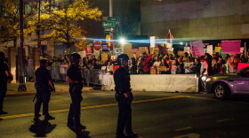 As President Trump took center stage in Syracuse's OnCenter, hundreds of protestors were met with a police barricade outside the venue.