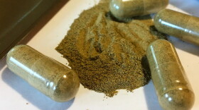FILE - Kratom capsules are seen on Sept. 27, 2017, in Albany, N.Y. (AP Photo/Mary Esch, File)