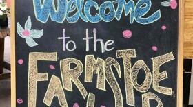 "Welcome to the Farmstore" sign