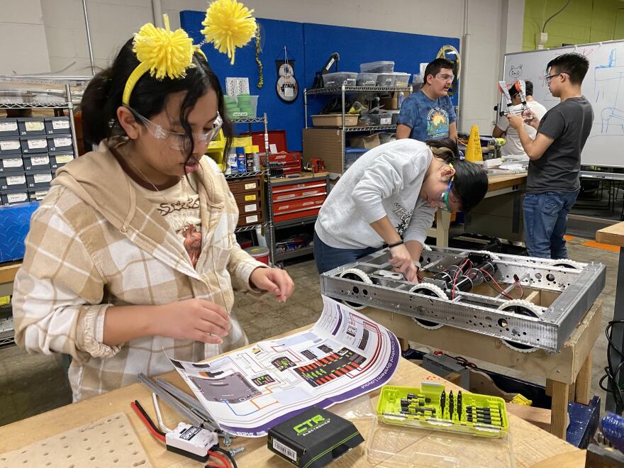 A student working on a robotics project.