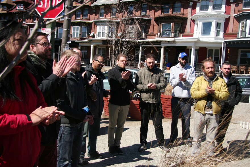 Once a month, a men's group in Philadelphia meets to exchange ideas and share their experiences. With the support of the group, Jeremy Gillam (third from right), who coaches an after-school hockey league, teaches his team nonviolent responses to aggression on the ice.