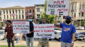 The Bloomington demonstration was one of dozens around the world Saturday expressing solidarity with Palestinians.