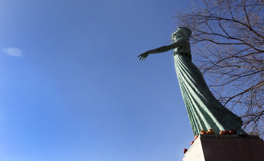 Minerva, Goddess of Wisdom stands outside the Elliott University Center in the center of UNC Greensboro's campus