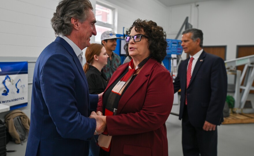 U.S. Secretary of the Interior and chair of the National Energy Dominance council Doug Burgum shakes hands with Lackawanna College President Dr. Jill Murray.