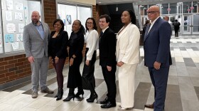Akron Public Schools' new board lineup after a swearing-in ceremony in early January 2026. New President Barbara Sykes is third from the left. Vice President Rene Molenaur is to her right.