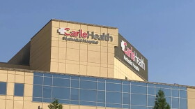 A medical building that says "Carle Health Methodist Hospital"