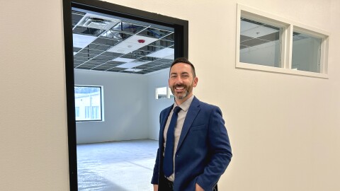 Valor Preparatory Academy Head of School Wes Kanawyer pauses in front of a newly built classroom during a walkthrough of the new Valor Prep location at 7542 Bosque Boulevard. Most of the classrooms feature large windows, part of the new campus's focus on natural lighting.
