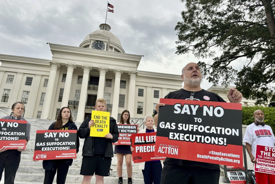 FILE - Abraham Bonowitz, executive director of Death Penalty Action, and other death penalty opponents hold a demonstration outside the Alabama Capitol in Montgomery, Ala., Wednesday, Sept. 25, 2024, asking the state to call off the scheduled execution of Alan Miller in what would be the nation's second execution using nitrogen gas. (AP Photo/Kim Chandler, File)
