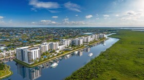 Two of the proposed "Seven Islands" in Northwest Cape Coral, off Old Burnt Store Road, are displayed by a 3D graphic from the rear. 