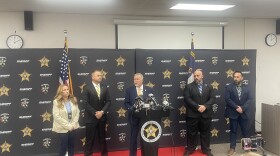 Iredell County Sheriff Darren Campbell at the podium along with officials