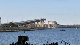 The state government held a remembrance event with the backdrop where the Francis Scott Key Bridge collapsed. Photo by Wambui Kamau/WYPR.