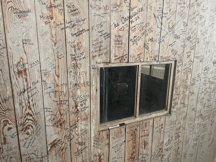 One of the wooden walls that are ceremoniously signed upon access to the tower. It houses the clock mechanism.