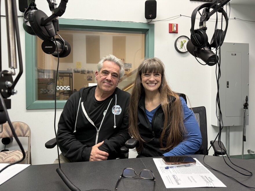 Sean O'Reilly and Johna Beech sit in KDLL's studio on Tuesday, Sept. 23, 2025 in Kenai, Alaska.