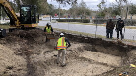 Construction workers in Clearwater dig up a site