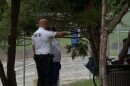 An officer speaking with someone in Seminary Park.