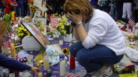 Toni Ann Costa mourns the victims of the World Trade Center disaster on Sept. 14, 2001.