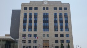 A now-former Kansas City police officer has been charged with involuntary manslaughter in the fatal vehicle crash that killed a teenager. Above, Kansas City, Missouri, Police Headquarters.